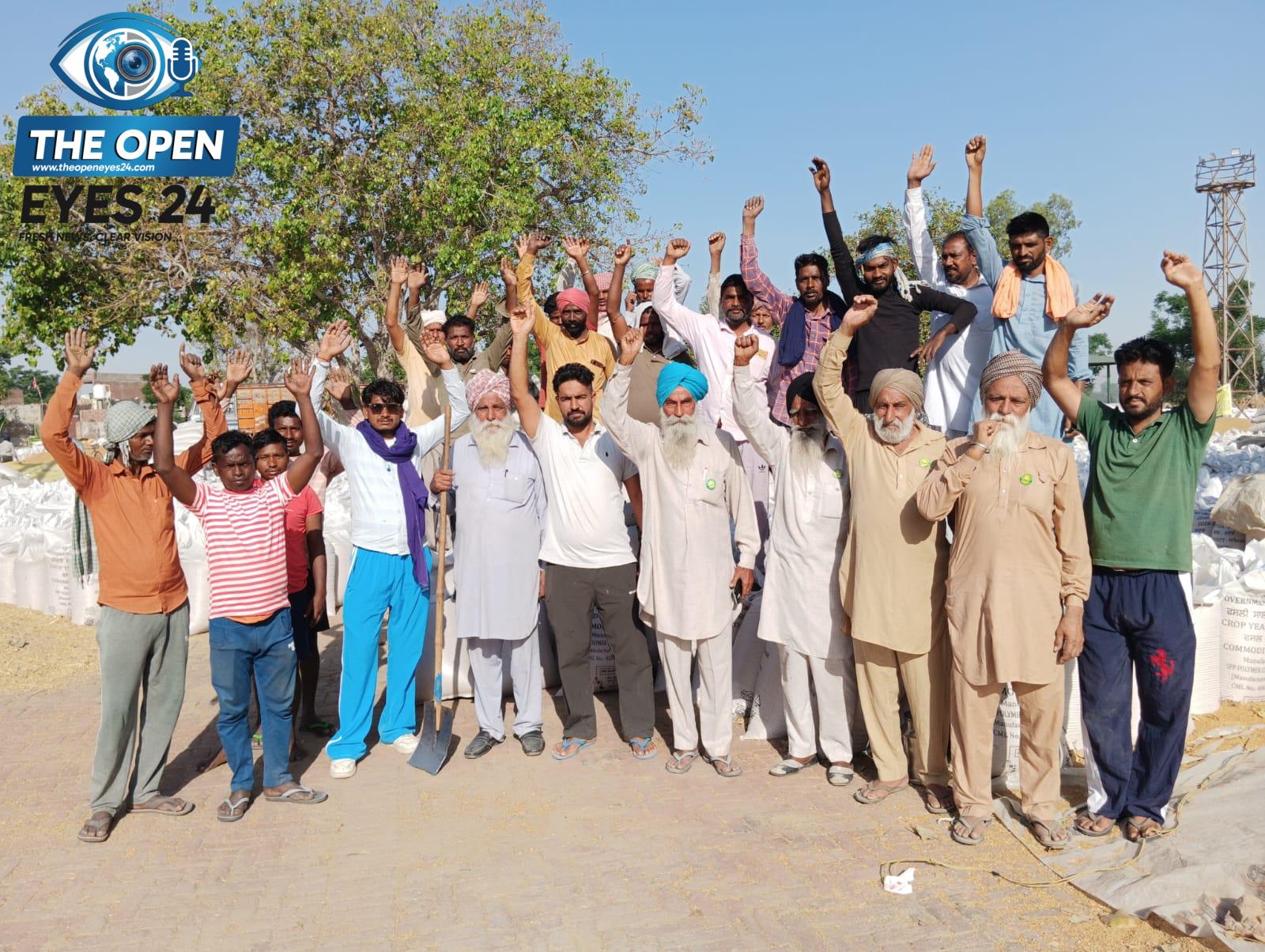 ਕੈਪਸ਼ਨ:ਭਾਰਤੀ ਕਿਸਾਨ ਯੂਨੀਅਨ ਉਗਰਾਹਾਂ ਦੀ ਅਗਵਾਈ ਹੇਠ ਕਿਸਾਨਾਂ-ਮਜ਼ਦੂਰਾਂ ਨੇ ਖਰੀਦ ਤੇ ਲਿਫਟਿੰਗ ਤੁਰੰਤ ਤੇਜ਼ ਕਰਨ ਦੀ ਮੰਗ ਕੀਤੀ ਫੋਟੋ