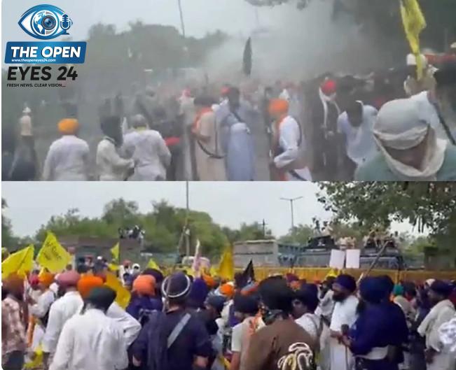 ਚੰਡੀਗੜ੍ਹ-ਮੋਹਾਲੀ ਸਰਹੱਦ 'ਤੇ ਪ੍ਰਦਰਸ਼ਨਕਾਰੀਆਂ ਨੂੰ ਰੋਕਣ ਲਈ ਪਾਣੀ ਦੀਆਂ ਬੁਛਾੜਾਂ ਛੱਡਦੀ ਅਤੇ ਅੱਥਰੂ ਗੈਸ ਦੇ ਗੋਲੇ ਦਾਗਦੀ ਹੋਈ ਪੁਲਿਸ।